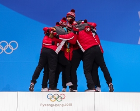 Canada's figure skaters celebrate a gold medal victory in the Team Event. (Photo: Greg Kolz)