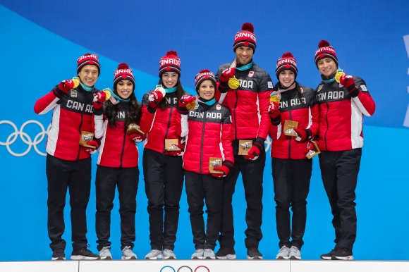 Canada's figure skaters own the podium following the Team Event. (Photo: Greg Kolz)