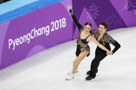 Tessa Virtue & Scott Moir performing their Latin-themed short dance during the Figure Skating Team Event. (Photo: Greg Kolz)
