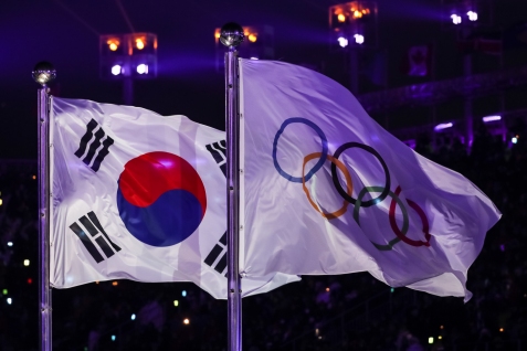 February 9, 2018: The Korean and Olympic flags flying side-by-side during the Opening Ceremony at PyeongChang Olympic Stadium. (PHOTO: Greg Kolz)