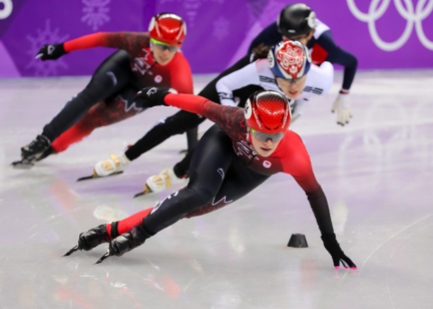 February 22, 2018: Short track skater Kim Boutin competing in the ladies' 1000m final. (PHOTO: Greg Kolz)